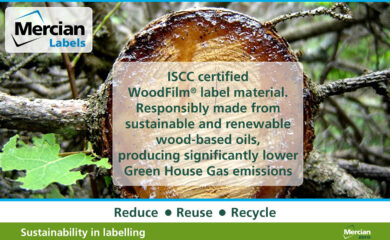 A picture looking end on at a sawn through tree trunk with sap oozing from it, with the words 'ISCC certified WoodFilm® label material. Responsibly made from sustainable and renewable wood-based oils, producing significantly lower Green House Gas emissions' overlaid on it