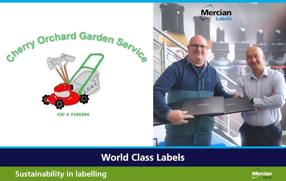 A rectangular image with the logo for Cherry Orchard Garden Service on the left hand side which incorporates a cartoon style bright red lawn mower with a bright green handle and a garden shovel, rake and hoe propped up behind it, whilst on the right hand side is a photo of two white, shaven headed men (one wearing jeans and navy blue and dark green fleece jacket and the other wearing business suit trousers and a blue and white striped shirt) smiling and facing the camera as the three laptops are handed over.