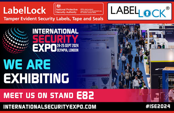 Image with a red header with white text saying ‘LabelLock Tamper Evident Security Labels, Tape and Seals’ next to the NPSA (National Protective Security Authority) and LabelLock logos. Beneath that is a raised viewpoint image of an exhibition hall with a variety of stands and visitors walking the aisles and overlaid that image to the left hand side is the International Security Expo logo with the date ‘24-25 Sept 2024’ and venue ‘Olympia, London’ below it, followed by larger text saying ‘We are exhibiting. Meet us on Stand E82’ and the website address of ‘Internationalsecurityexpo.com’.