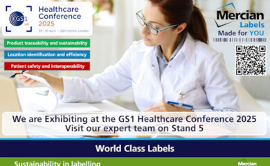 Promotional banner for Mercian Labels announcing their exhibition at the GS1 Healthcare Conference 2025, held on 29–30 April at the QEII Centre in London. A female healthcare professional is reviewing documents. Key topics include product traceability and sustainability (green bar), location identification and efficiency (blue bar), and patient safety and interoperability (red bar). The text invites attendees to visit their expert team on Stand 5. The Mercian Labels logo and a QR code are shown on the right, along with slogans "World Class Labels" and "Sustainability in labelling."