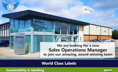 Photo of the Mercian Labels company building with glass-fronted entrance, company signage, and a flag flying outside. A banner overlay reads: ‘We are looking for a new Sales Operations Manager to join our amazing, award-winning team.’ Additional text at the bottom says ‘World Class Labels’ and ‘Sustainability in labelling.’ Several cars are parked along the side of the building under a partly cloudy sky.